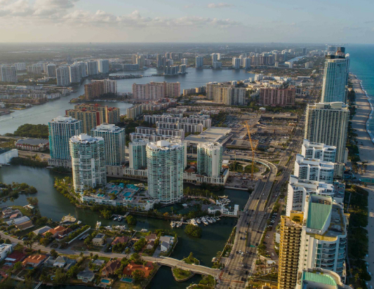 Aerial view of Sunny Isles Beach coastline with luxury condominiums
