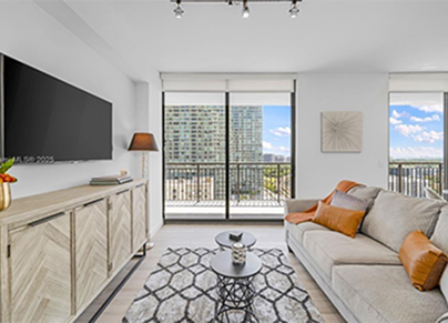 Modern condo interior with city views and contemporary furnishings